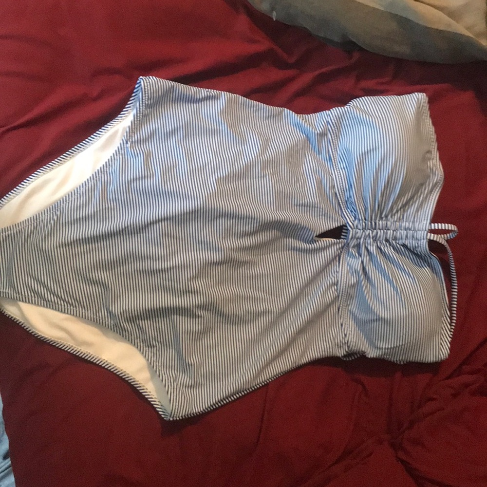 One piece “cheeky” bathing suit.